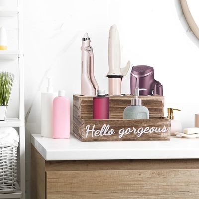 Hou uw badkamer gemakkelijk opgeruimd met deze houten haardroger en -regelaar