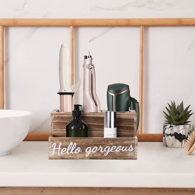 Hou uw badkamer gemakkelijk opgeruimd met deze houten haardroger en -regelaar