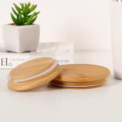 Gepersonaliseerde natuurlijke kleur decoratieve bamboe deksels voor hoge borosilicaat glas mok potten