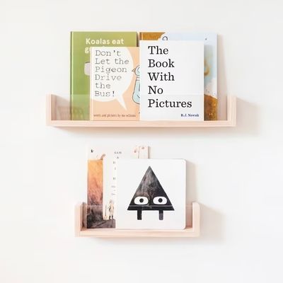 Bespaar ruimte en voeg stijl toe aan de kinderkamer van uw kinderen met Acryl Floating Bookshelf Wall
