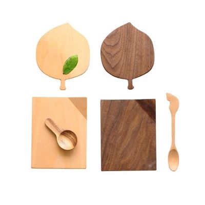 Eco-vriendelijke beuk- en walnoothouten laagjes voor warme dranken