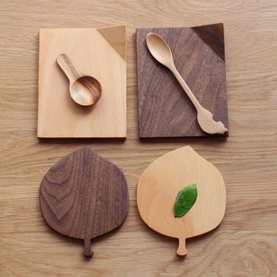 Eco-vriendelijke beuk- en walnoothouten laagjes voor warme dranken